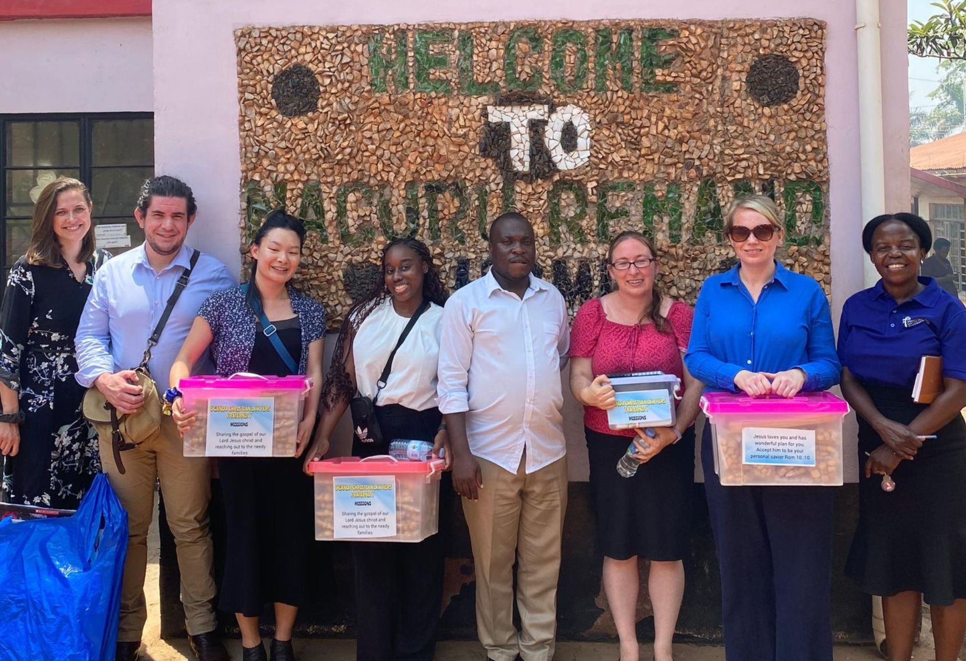 The team visiting a Ugandan remand home with the UCLF councillor (far right), providing tracts and snacks