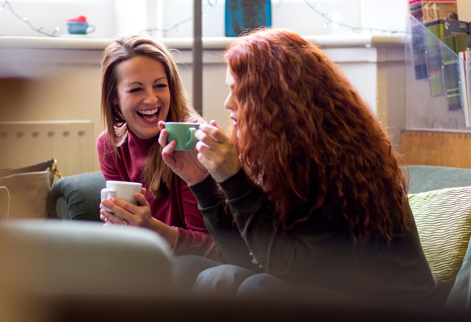 Photograph of women chatting and laughing