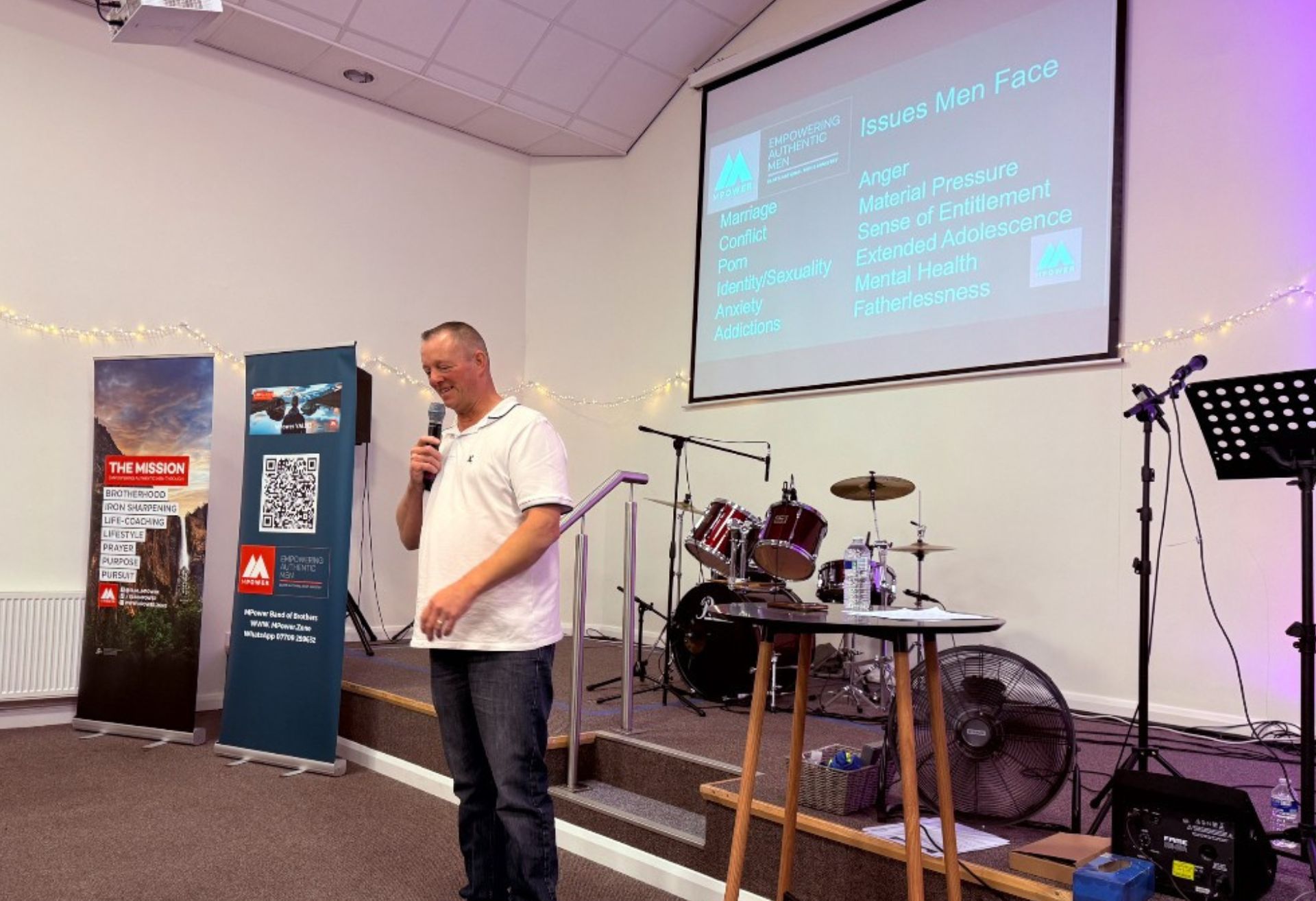 Photograph of a speaker at the MPower event