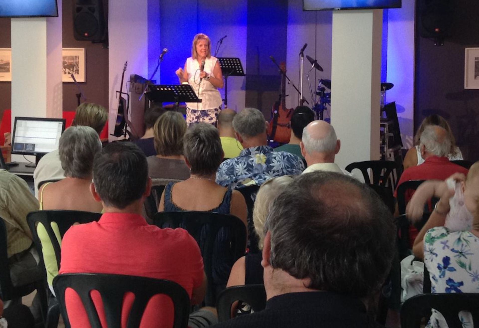 Image of Howard and Sue Coley preaching at a service